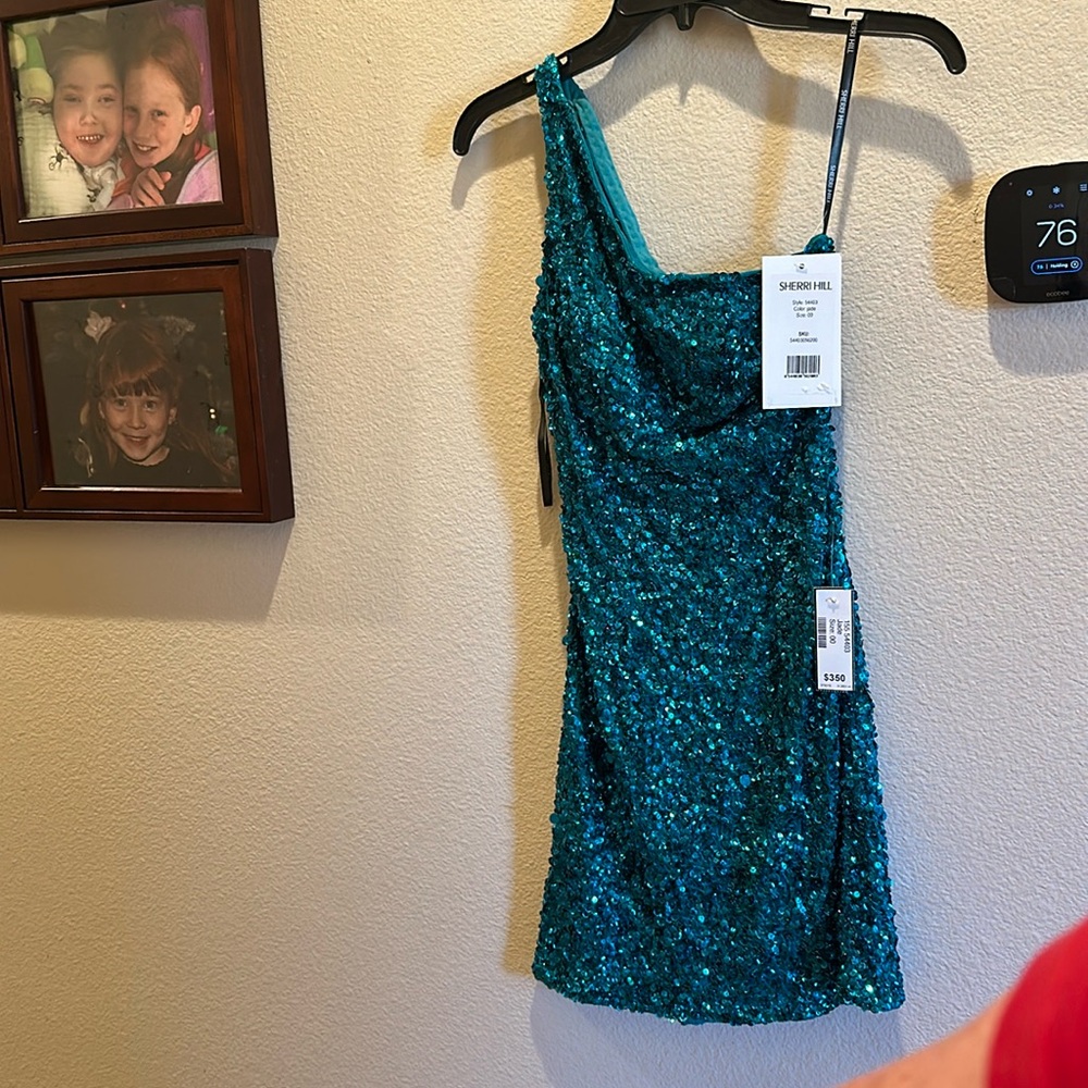Jade sequin Sherri Hill mini dress. Never worn- tags still on it. Size 00.